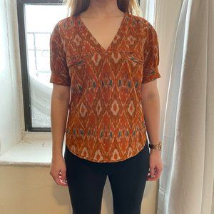 Orange Batik-style v neck top
